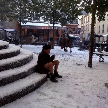 Snow-covered plaza with people